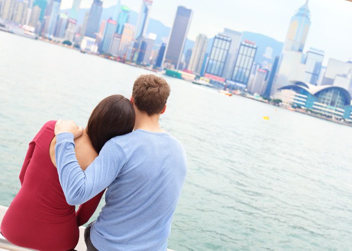 couple on the river shore