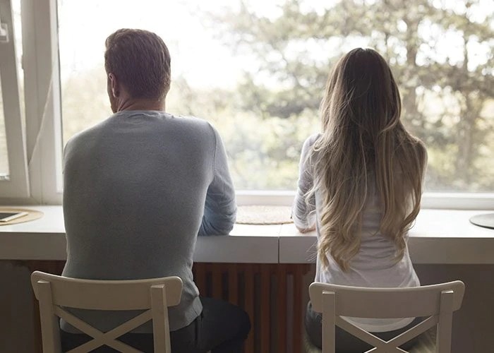 couple sitting by the window