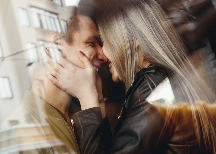 ouple behind the glass