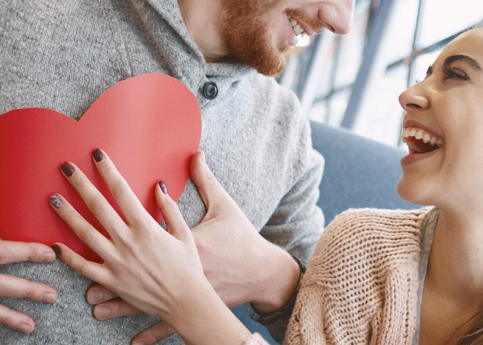 couple with paper heart