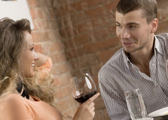 couple drinks wine in the restaurant