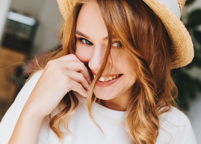 happy woman in hat